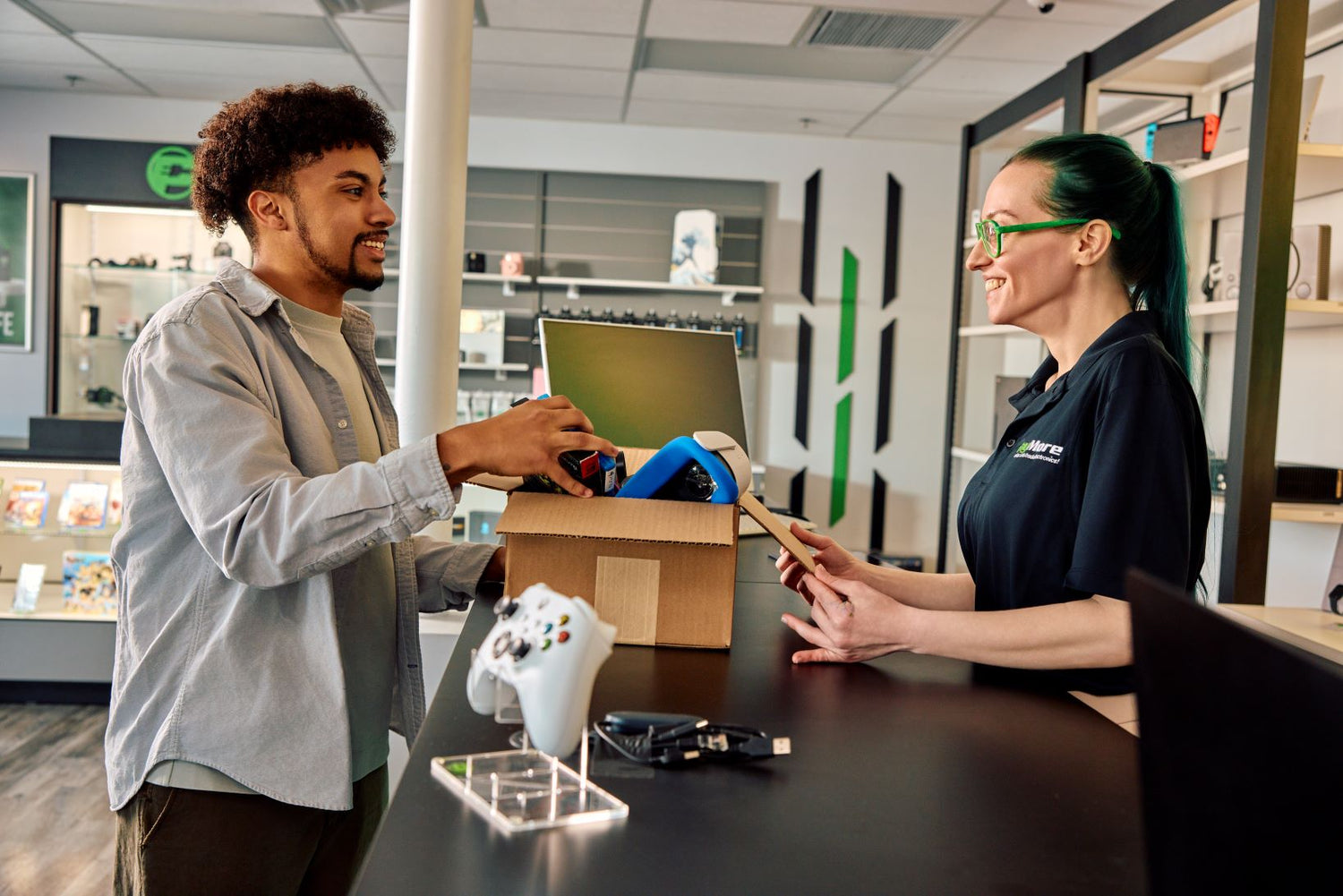 man trading in electronics at paymore